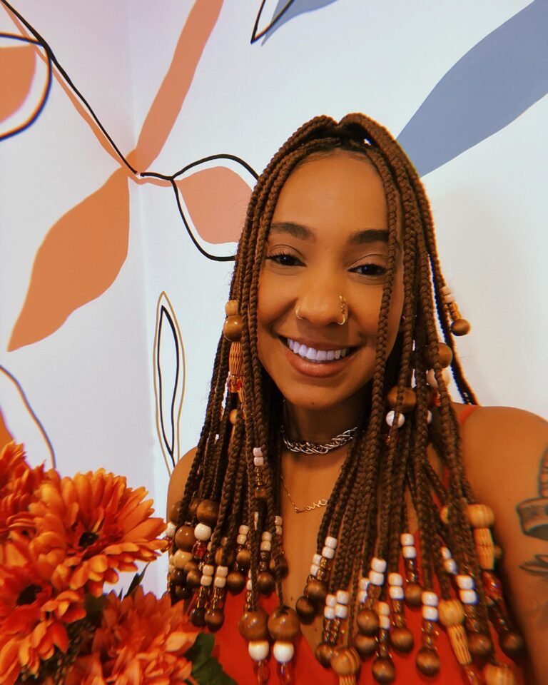 Imagem da cantora Mel Duarte